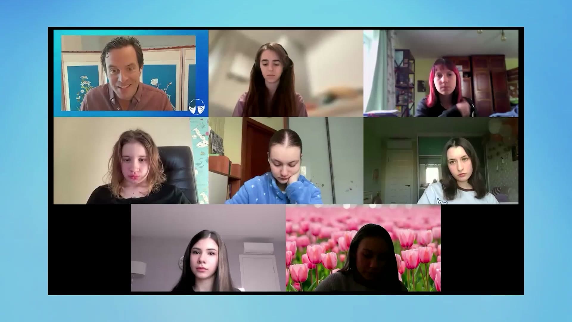 A live Global Cohorts lesson: a Banyan facilitator on the classroom screen with a class of students